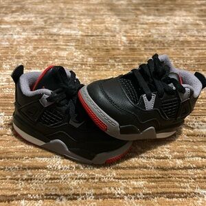 Jordan Bred 4’s
Black, grey, red 
6c 
Toddler